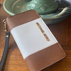 Michael Kors wristlet. Holds a small phone